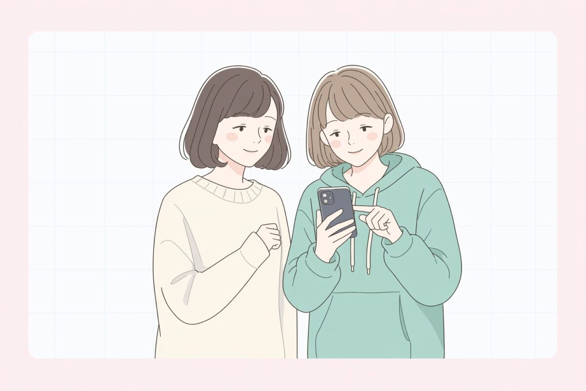 ミホとリナ、並んでスマホを覗く